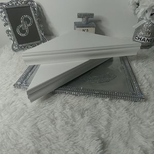 2 white corner shelves
